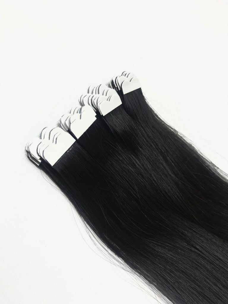 Black color tape in hair extensions